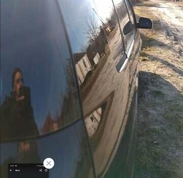 Черный Киа Каренс, объемом двигателя 2 л и пробегом 320 тыс. км за 5830 $, фото 11 на Automoto.ua