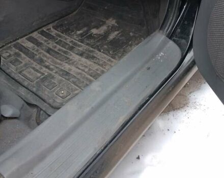 Черный Киа Каренс, объемом двигателя 2 л и пробегом 320 тыс. км за 5830 $, фото 14 на Automoto.ua