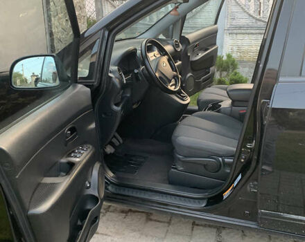 Чорний Кіа Каренс, об'ємом двигуна 2 л та пробігом 199 тис. км за 6400 $, фото 4 на Automoto.ua
