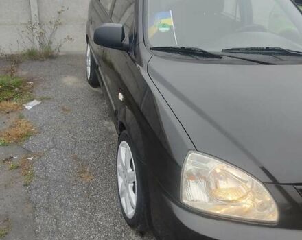 Чорний Кіа Каренс, об'ємом двигуна 1.98 л та пробігом 288 тис. км за 4500 $, фото 2 на Automoto.ua