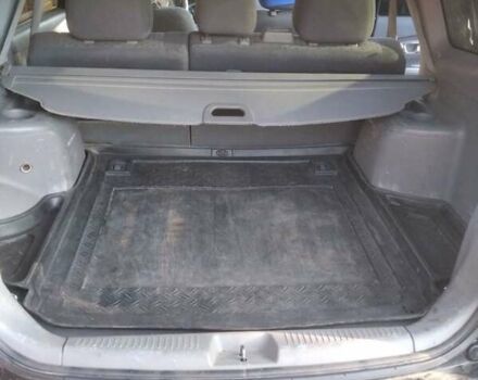 Черный Киа Каренс, объемом двигателя 2 л и пробегом 320 тыс. км за 5830 $, фото 22 на Automoto.ua