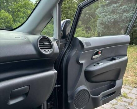 Черный Киа Каренс, объемом двигателя 2 л и пробегом 188 тыс. км за 7200 $, фото 12 на Automoto.ua