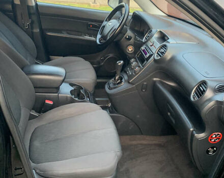 Чорний Кіа Каренс, об'ємом двигуна 2 л та пробігом 199 тис. км за 6400 $, фото 7 на Automoto.ua