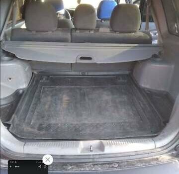 Черный Киа Каренс, объемом двигателя 2 л и пробегом 320 тыс. км за 5830 $, фото 12 на Automoto.ua