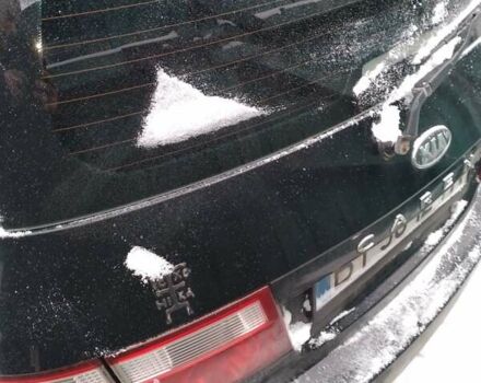 Черный Киа Каренс, объемом двигателя 2 л и пробегом 320 тыс. км за 5830 $, фото 2 на Automoto.ua