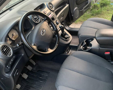 Чорний Кіа Каренс, об'ємом двигуна 2 л та пробігом 199 тис. км за 6400 $, фото 5 на Automoto.ua