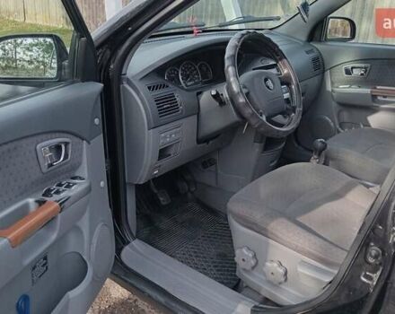 Киа Каренс 2006 в Прилуках на Automoto.ua Черный Киа Каренс, объемом двигателя 1.99 л и пробегом 255 тыс. км за 2550 $, фото 8 на Automoto.ua