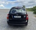 Черный Киа Каренс, объемом двигателя 2 л и пробегом 188 тыс. км за 7200 $, фото 5 на Automoto.ua