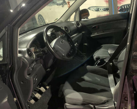 Чорний Кіа Каренс, об'ємом двигуна 2 л та пробігом 199 тис. км за 6400 $, фото 9 на Automoto.ua