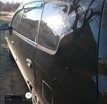 Черный Киа Каренс, объемом двигателя 2 л и пробегом 320 тыс. км за 5830 $, фото 10 на Automoto.ua