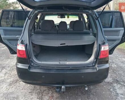 Киа Каренс 2006 в Прилуках на Automoto.ua Черный Киа Каренс, объемом двигателя 1.99 л и пробегом 255 тыс. км за 2550 $, фото 6 на Automoto.ua