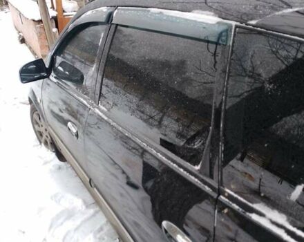 Черный Киа Каренс, объемом двигателя 2 л и пробегом 320 тыс. км за 5830 $, фото 8 на Automoto.ua