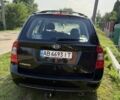 Черный Киа Каренс, объемом двигателя 2 л и пробегом 298 тыс. км за 5500 $, фото 8 на Automoto.ua