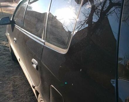 Черный Киа Каренс, объемом двигателя 2 л и пробегом 320 тыс. км за 5830 $, фото 23 на Automoto.ua