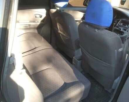 Черный Киа Каренс, объемом двигателя 2 л и пробегом 320 тыс. км за 5830 $, фото 21 на Automoto.ua