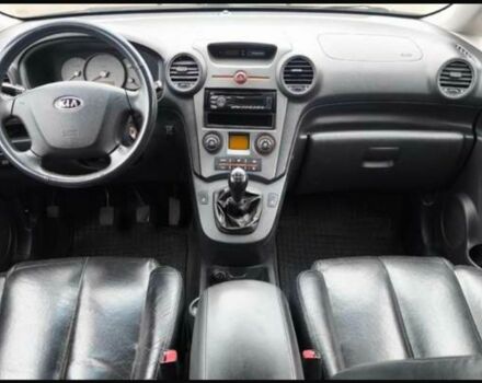 Черный Киа Каренс, объемом двигателя 2 л и пробегом 299 тыс. км за 3000 $, фото 3 на Automoto.ua