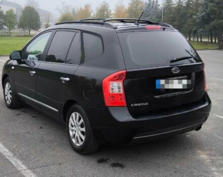 Черный Киа Каренс, объемом двигателя 2 л и пробегом 299 тыс. км за 3000 $, фото 5 на Automoto.ua