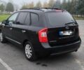 Черный Киа Каренс, объемом двигателя 2 л и пробегом 299 тыс. км за 3000 $, фото 5 на Automoto.ua