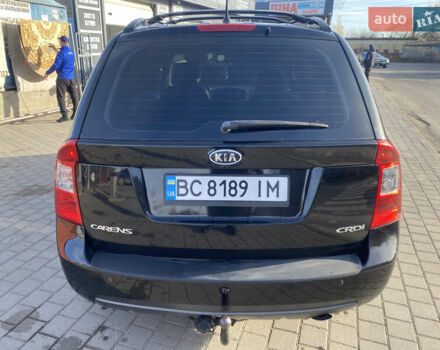 Чорний Кіа Каренс, об'ємом двигуна 2 л та пробігом 229 тис. км за 6900 $, фото 4 на Automoto.ua
