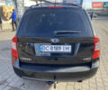 Чорний Кіа Каренс, об'ємом двигуна 2 л та пробігом 229 тис. км за 6900 $, фото 4 на Automoto.ua