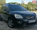 Чорний Кіа Каренс, об'ємом двигуна 2 л та пробігом 265 тис. км за 5800 $, фото 1 на Automoto.ua