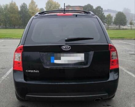 Черный Киа Каренс, объемом двигателя 2 л и пробегом 299 тыс. км за 3000 $, фото 11 на Automoto.ua