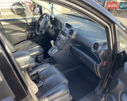 Чорний Кіа Каренс, об'ємом двигуна 2 л та пробігом 229 тис. км за 6900 $, фото 8 на Automoto.ua