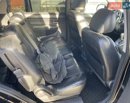 Чорний Кіа Каренс, об'ємом двигуна 2 л та пробігом 229 тис. км за 6900 $, фото 9 на Automoto.ua