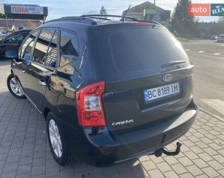 Чорний Кіа Каренс, об'ємом двигуна 2 л та пробігом 229 тис. км за 6900 $, фото 3 на Automoto.ua