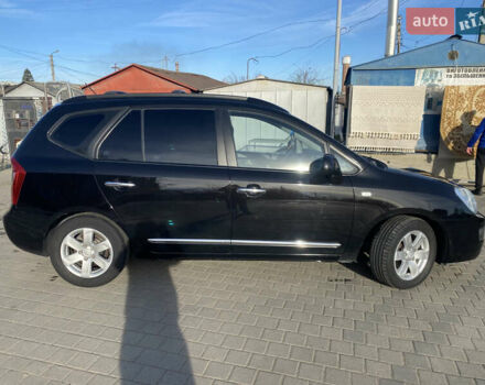 Чорний Кіа Каренс, об'ємом двигуна 2 л та пробігом 229 тис. км за 6900 $, фото 6 на Automoto.ua