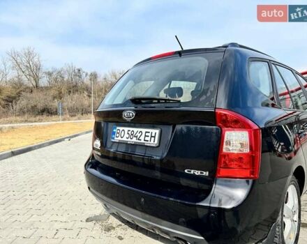 Черный Киа Каренс, объемом двигателя 1.99 л и пробегом 238 тыс. км за 5600 $, фото 2 на Automoto.ua