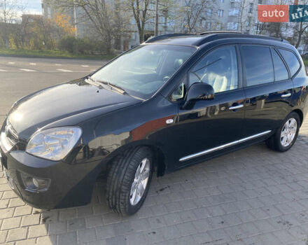 Чорний Кіа Каренс, об'ємом двигуна 2 л та пробігом 229 тис. км за 6900 $, фото 1 на Automoto.ua