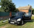 Черный Киа Каренс, объемом двигателя 2 л и пробегом 300 тыс. км за 5500 $, фото 8 на Automoto.ua