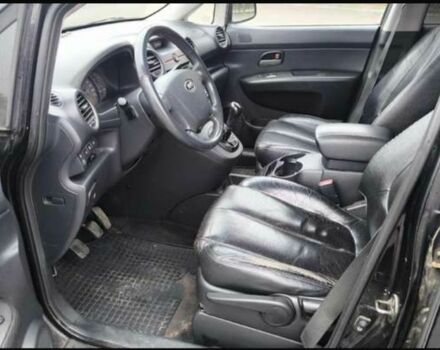 Черный Киа Каренс, объемом двигателя 2 л и пробегом 299 тыс. км за 3000 $, фото 8 на Automoto.ua