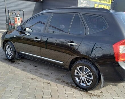 Черный Киа Каренс, объемом двигателя 2 л и пробегом 229 тыс. км за 5200 $, фото 2 на Automoto.ua