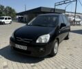 Чорний Кіа Каренс, об'ємом двигуна 2 л та пробігом 268 тис. км за 3799 $, фото 1 на Automoto.ua