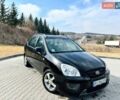 Черный Киа Каренс, объемом двигателя 1.99 л и пробегом 238 тыс. км за 5600 $, фото 1 на Automoto.ua