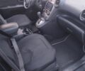 Чорний Кіа Каренс, об'ємом двигуна 2 л та пробігом 210 тис. км за 5800 $, фото 3 на Automoto.ua