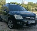 Чорний Кіа Каренс, об'ємом двигуна 2 л та пробігом 265 тис. км за 5800 $, фото 1 на Automoto.ua
