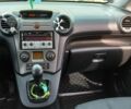 Черный Киа Каренс, объемом двигателя 2 л и пробегом 229 тыс. км за 5200 $, фото 5 на Automoto.ua