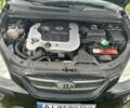 Черный Киа Каренс, объемом двигателя 2 л и пробегом 296 тыс. км за 7100 $, фото 4 на Automoto.ua