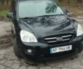 Чорний Кіа Каренс, об'ємом двигуна 2 л та пробігом 262 тис. км за 5999 $, фото 1 на Automoto.ua