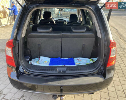 Чорний Кіа Каренс, об'ємом двигуна 2 л та пробігом 229 тис. км за 6900 $, фото 11 на Automoto.ua