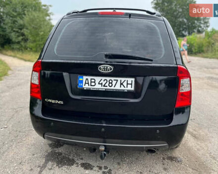 Черный Киа Каренс, объемом двигателя 2 л и пробегом 230 тыс. км за 5700 $, фото 3 на Automoto.ua