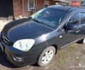 Черный Киа Каренс, объемом двигателя 2 л и пробегом 343 тыс. км за 6200 $, фото 1 на Automoto.ua