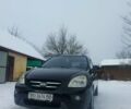 Черный Киа Каренс, объемом двигателя 1.99 л и пробегом 208 тыс. км за 6000 $, фото 1 на Automoto.ua