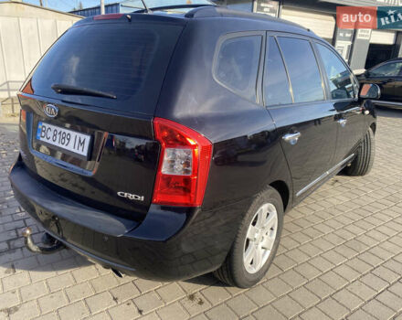 Чорний Кіа Каренс, об'ємом двигуна 2 л та пробігом 229 тис. км за 6900 $, фото 5 на Automoto.ua