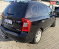 Чорний Кіа Каренс, об'ємом двигуна 2 л та пробігом 229 тис. км за 6900 $, фото 5 на Automoto.ua