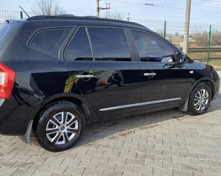 Черный Киа Каренс, объемом двигателя 2 л и пробегом 229 тыс. км за 5200 $, фото 1 на Automoto.ua