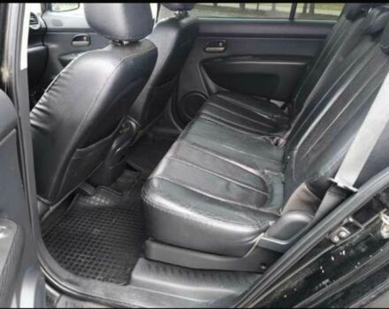 Черный Киа Каренс, объемом двигателя 2 л и пробегом 299 тыс. км за 3000 $, фото 4 на Automoto.ua